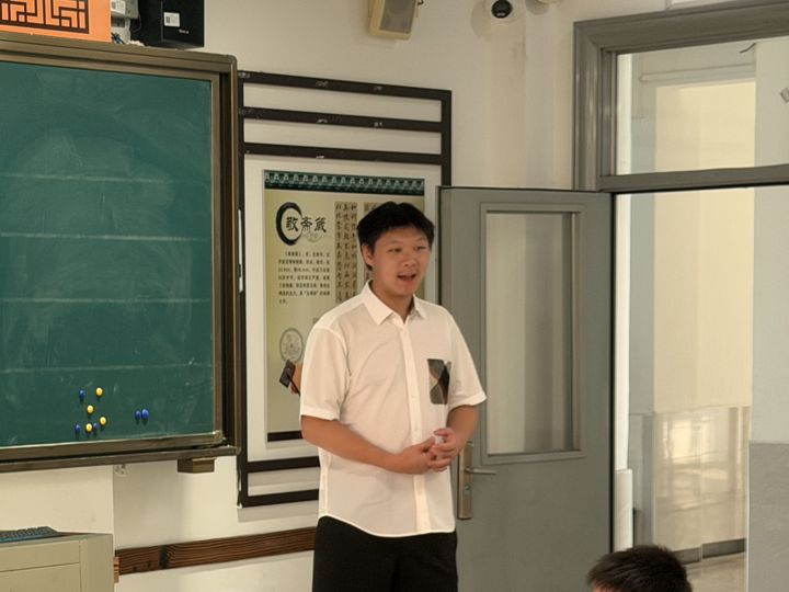 Alex speaking in a primary-school classroom